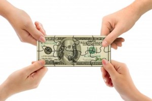 hands-pulling-dollar-bill-puzzle