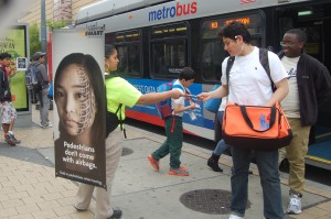 Street teams hand out safety materials to Metrobus riders